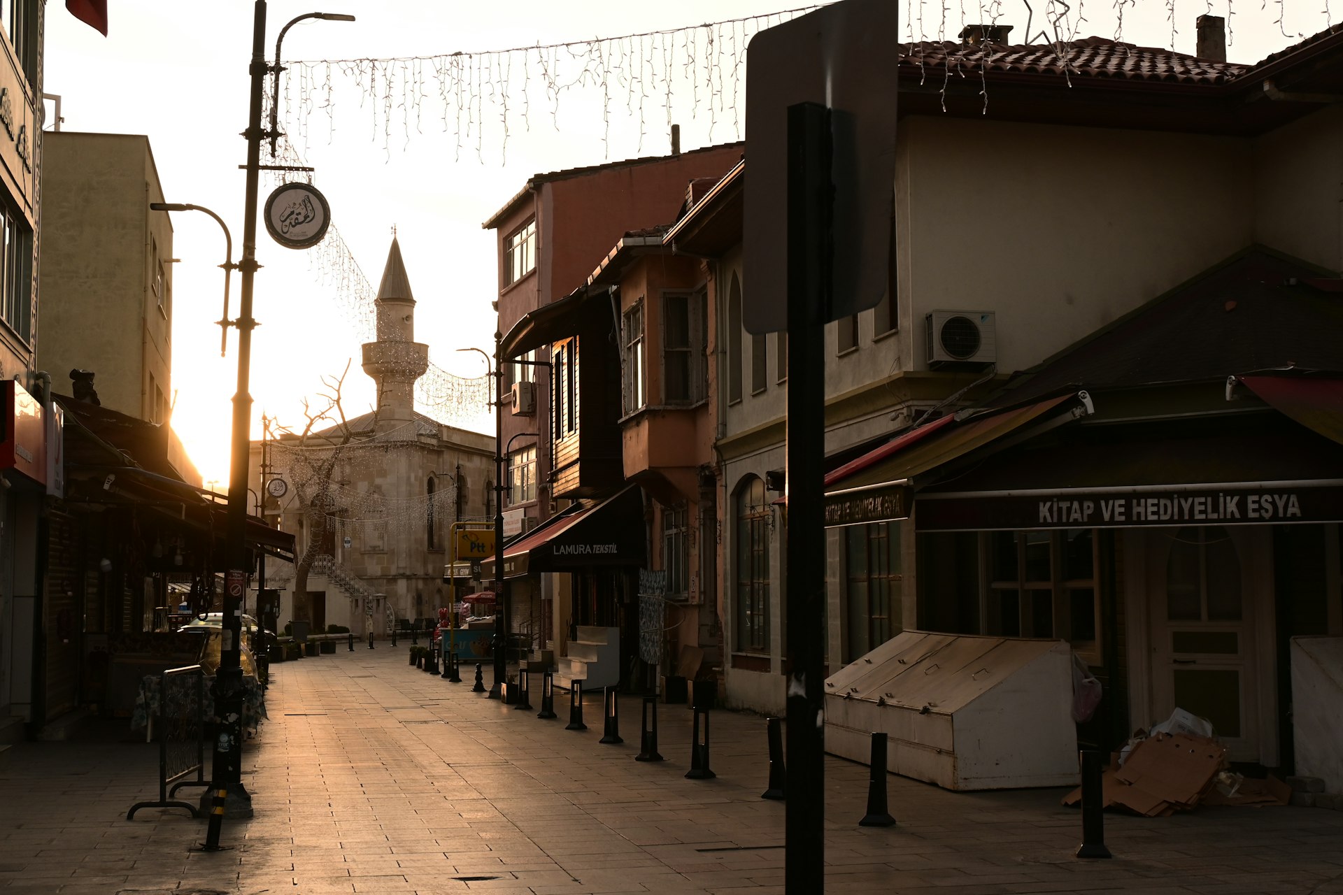 A street scene leads to a mosque.